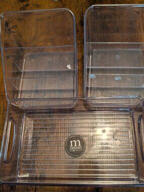 Four Plastic Organizers